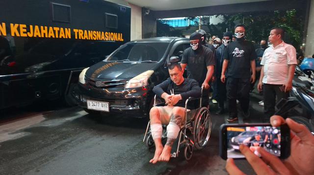 Andre The Doctor Hadir di Bareskrim: Dalam Kondisi Terbatas dengan Kursi Roda dan Borgol